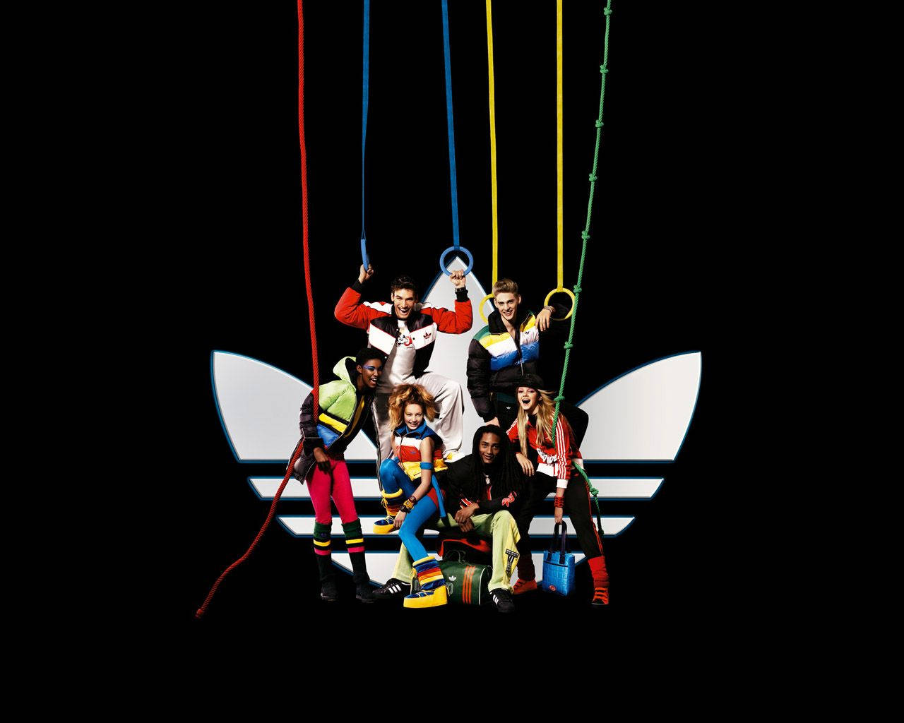 Adidas-brändin logo ja teini-ikäisiä malleja Taustakuvat