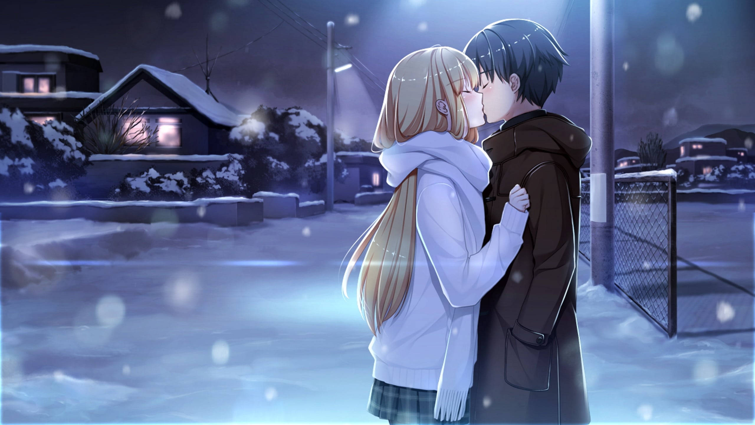 Anime-pari suutelee lumisateessa Taustakuvat