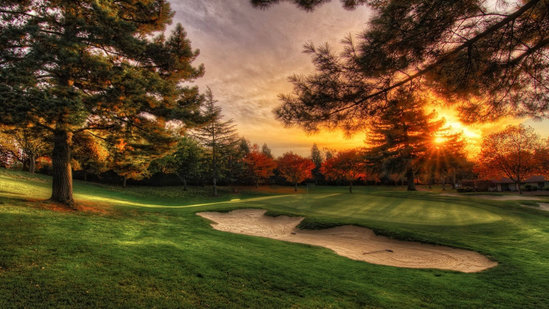 Auringonlasku golfkentällä Taustakuvat