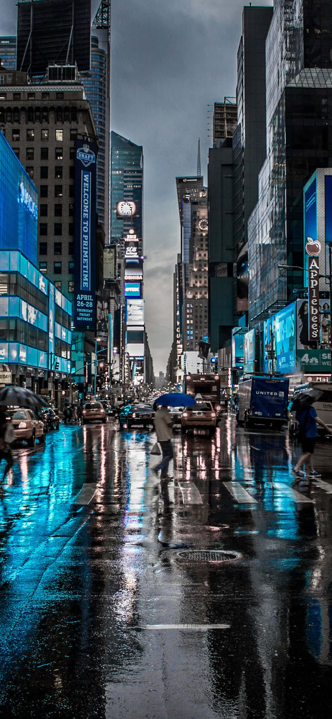 Auringonlaskun jahtaaminen New Yorkin horisontin yllä iPhone X:llä Taustakuvat