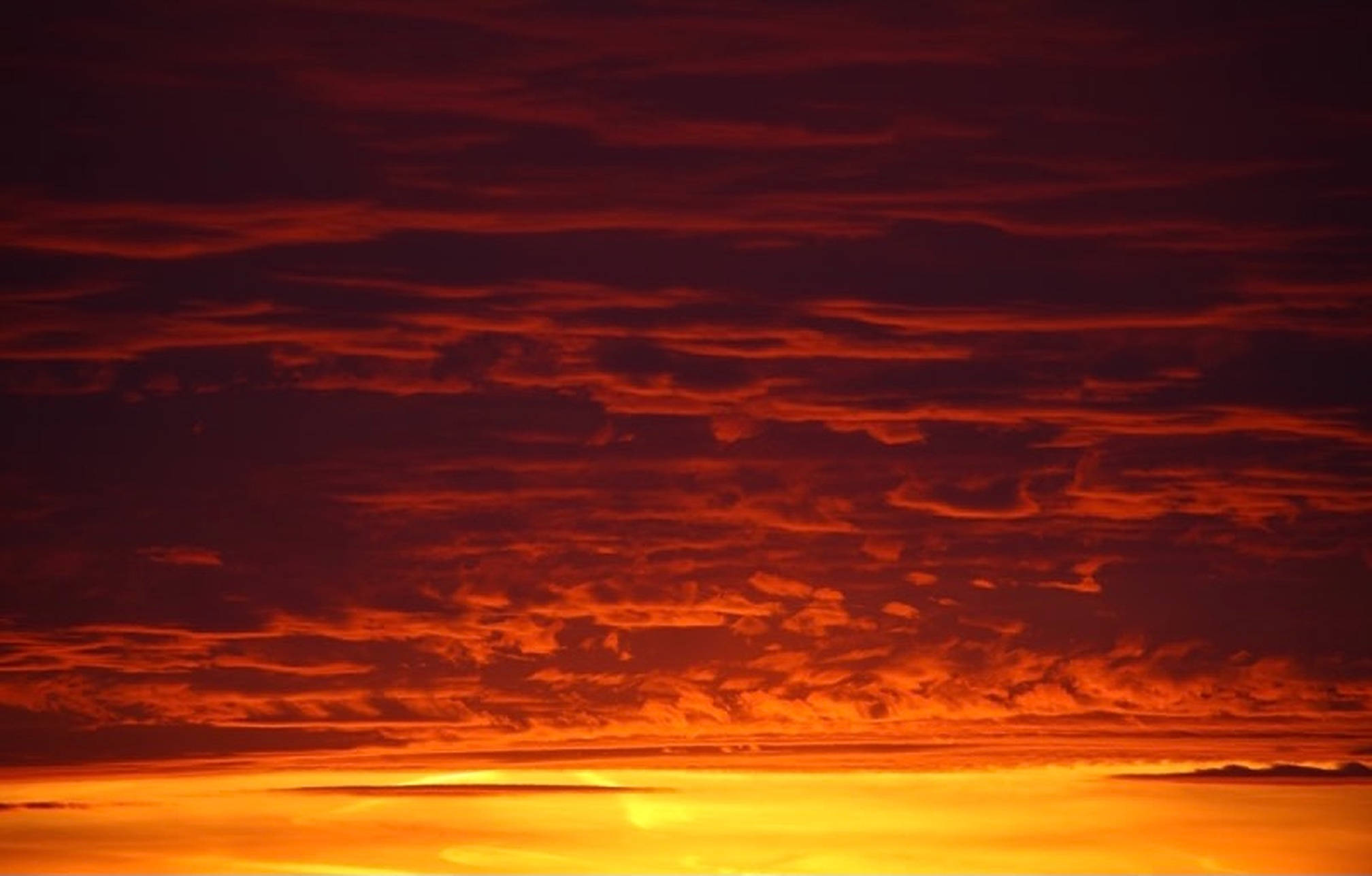 Auringonlaskun tummanoranssi taivas Taustakuvat