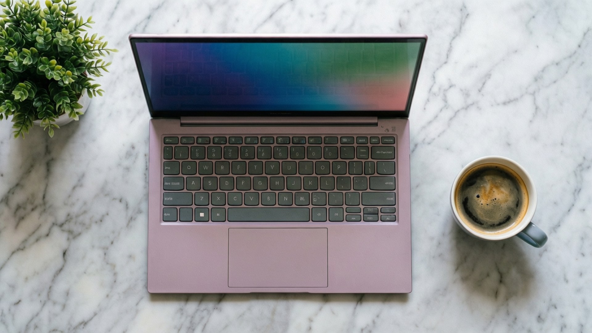 Chromebook-asetelma ylhäältä kuvattuna Taustakuvat