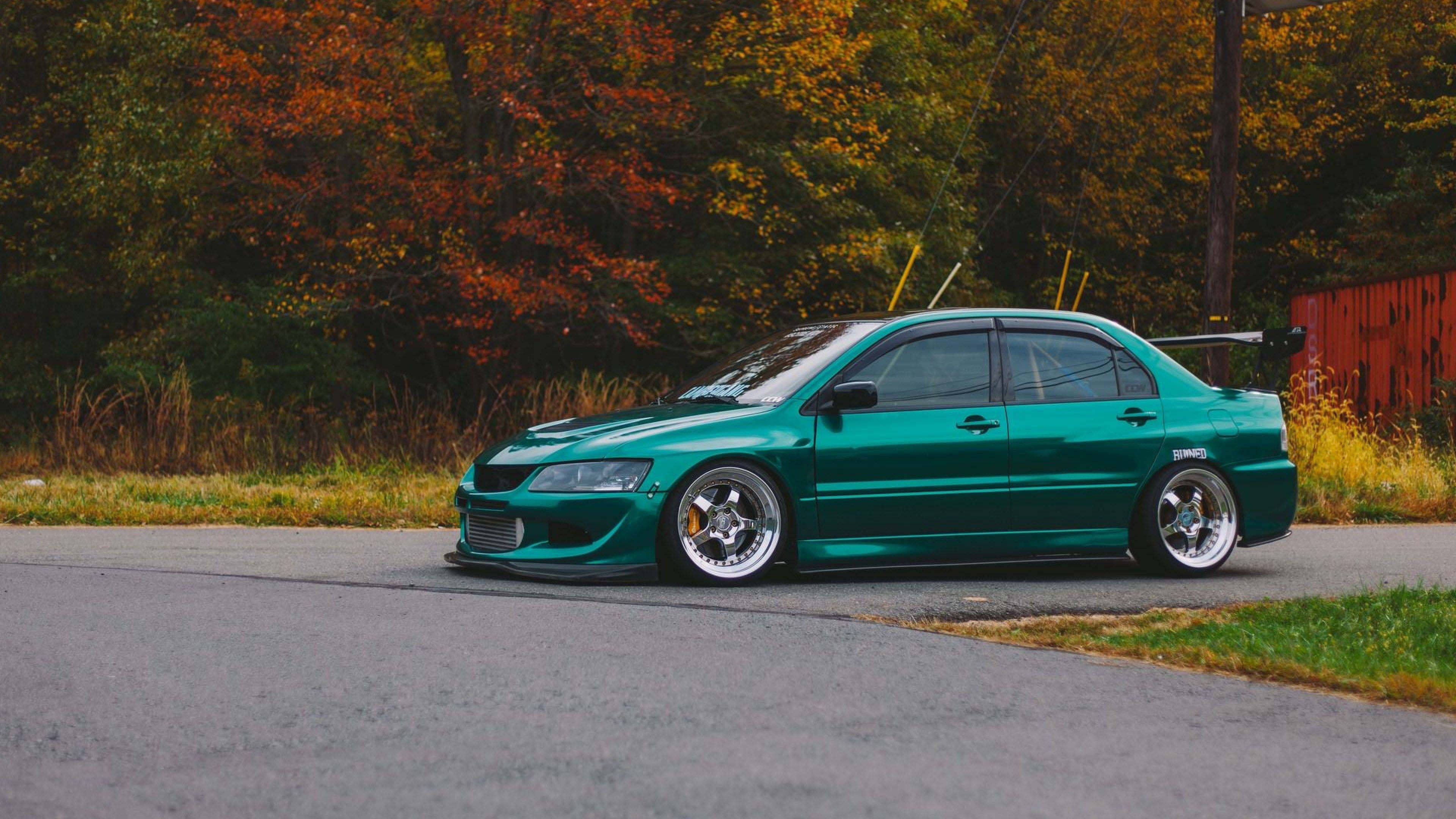 Cool JDM-estetiikka Mitsubishi Lancer Evolution Taustakuvat