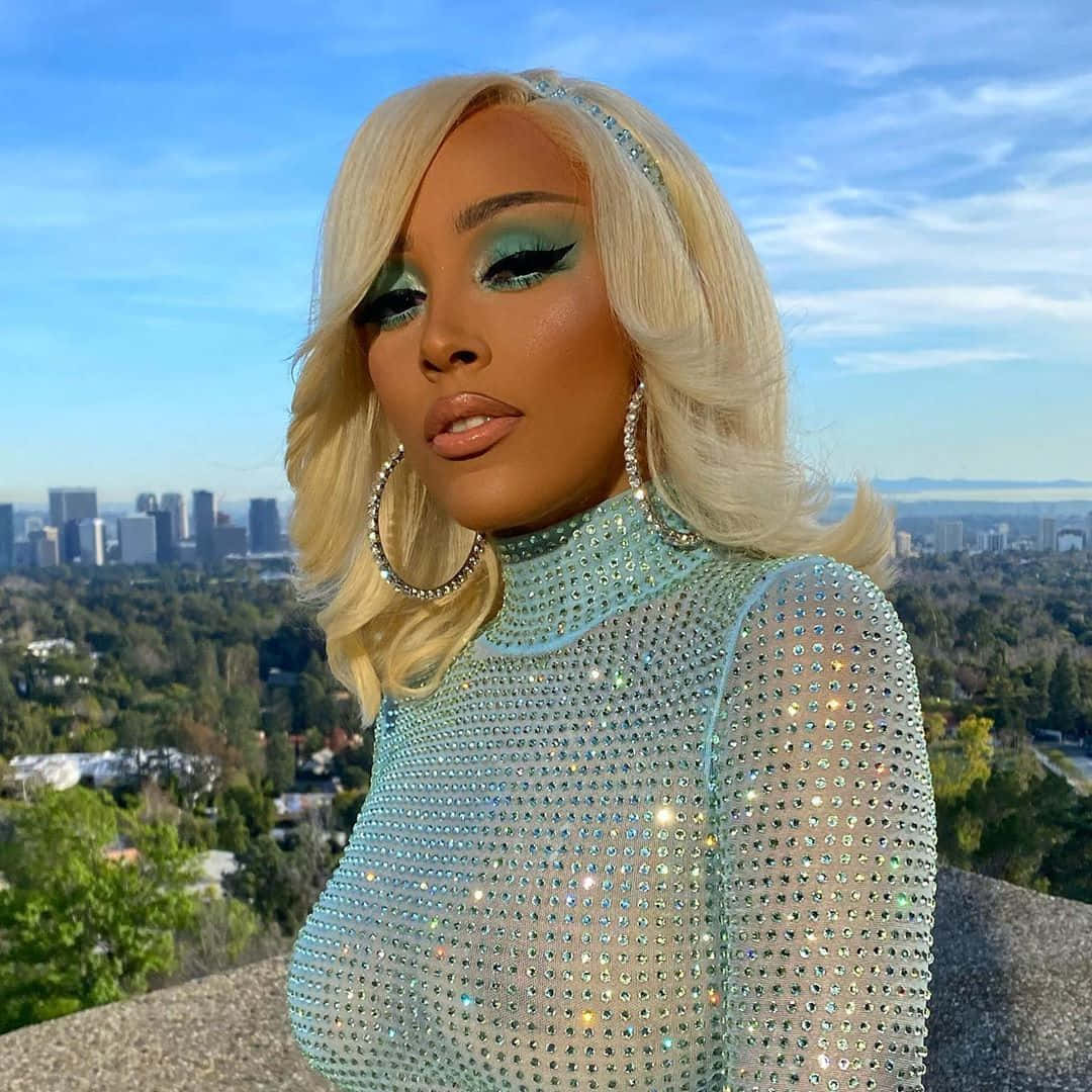 Doja Cat esiintyy lumoutuneelle yleisölle Taustakuvat