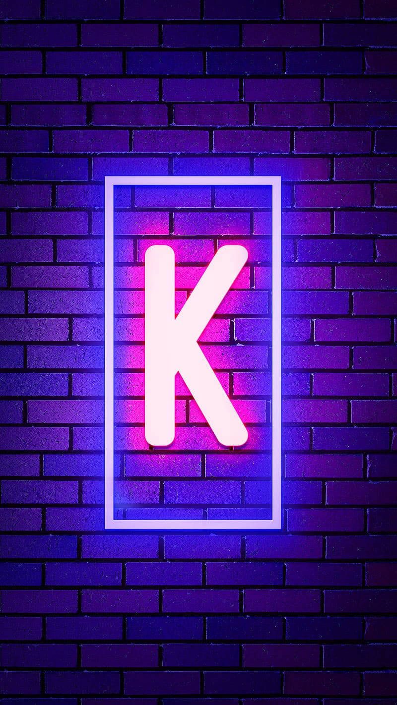 Hehkuva neonkirjain K -nimi Taustakuvat