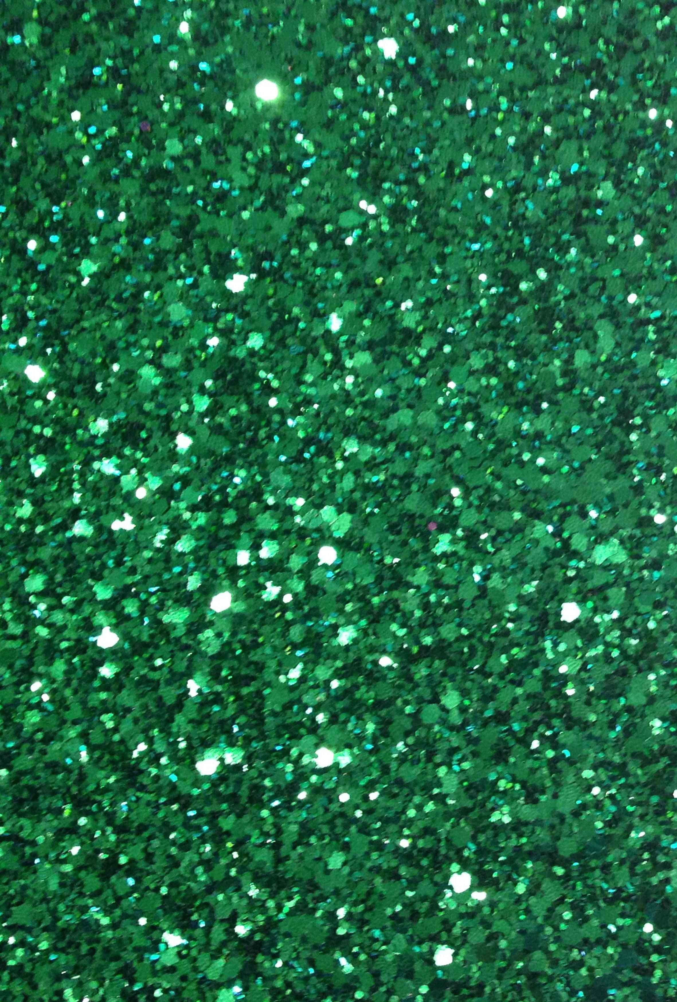 Hopeita smaragdinvihreällä glittertaustalla Taustakuvat
