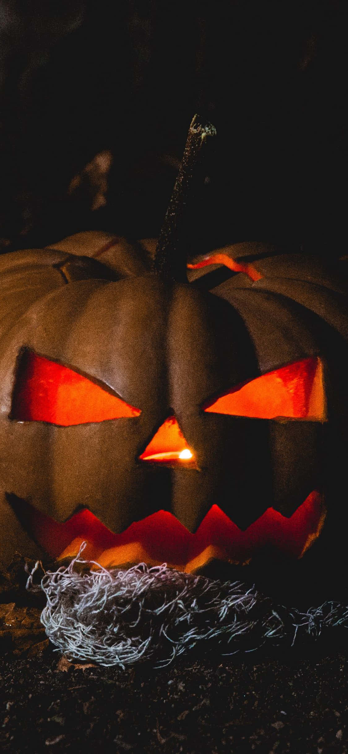 iPhone Halloween -tausta pelottavasta Jack O'Lanternista Taustakuvat