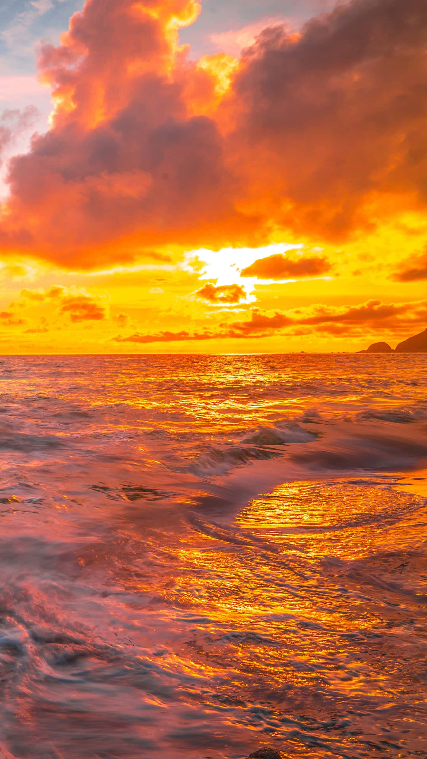 iPhone X Malibu -tausta pilvinen auringonlasku Taustakuvat