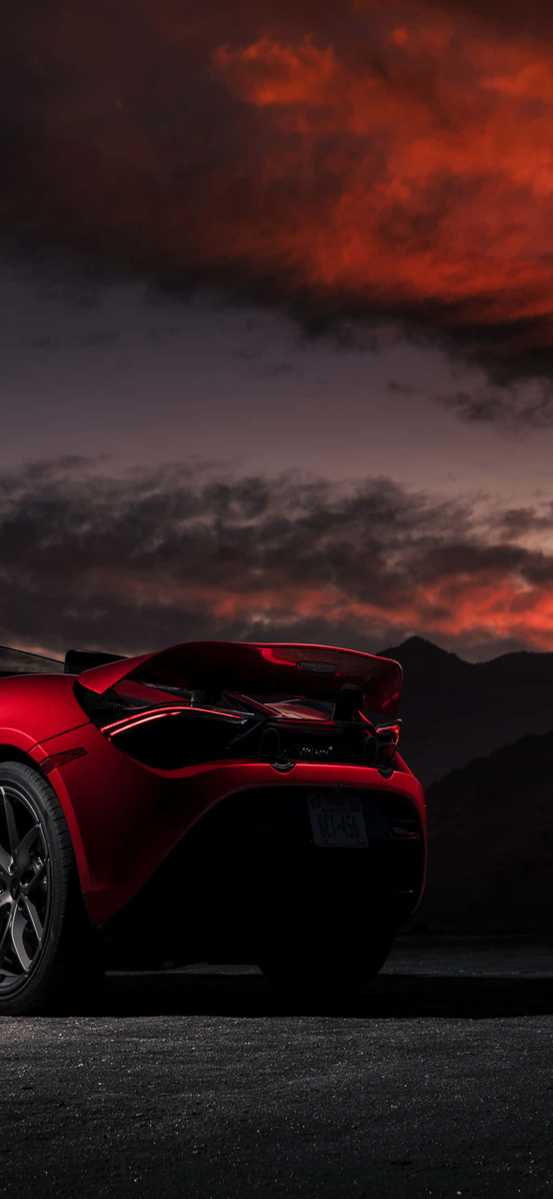 iPhone X McLaren 720s punainen auringonlasku -tausta Taustakuvat