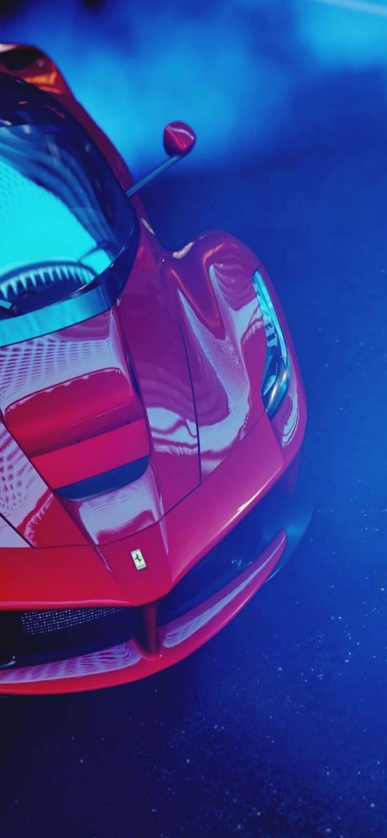 iPhone Xs Max Ferrari taustakuva kiiltävä punainen Ferrari sinisen savun peitossa Taustakuvat