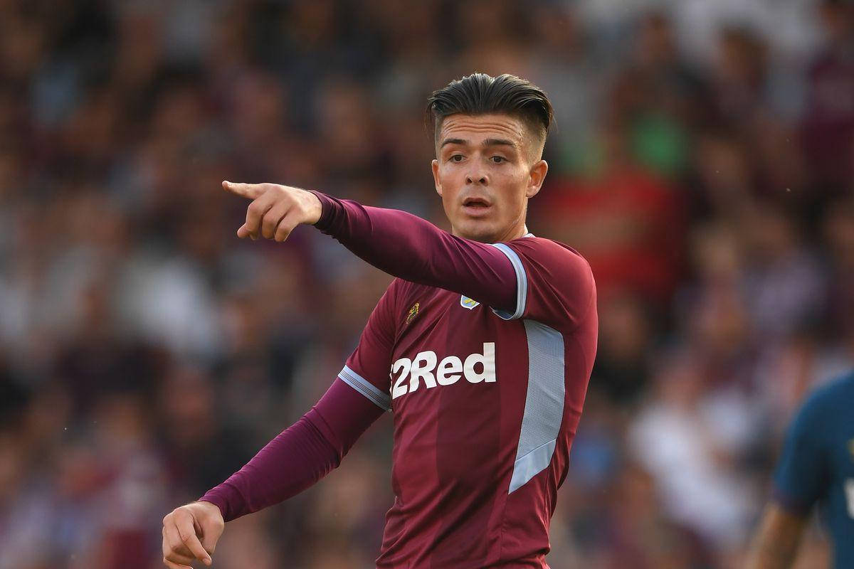 Jack Grealish osoittaa Taustakuvat