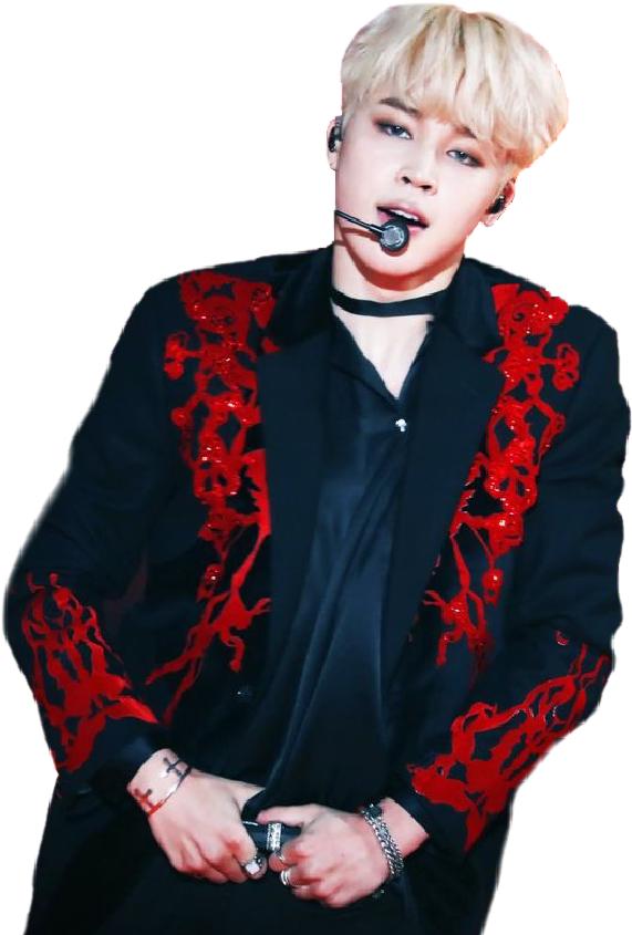 Jimin esiintymässä punaisella kirjailulla koristellussa takissa Taustakuvat