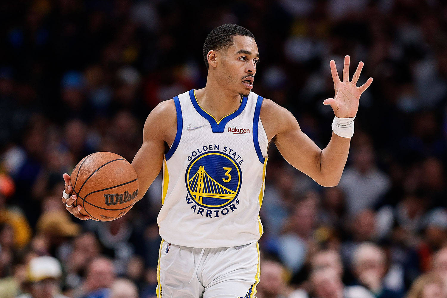 Jordan Poole kädet ylhäällä Taustakuvat