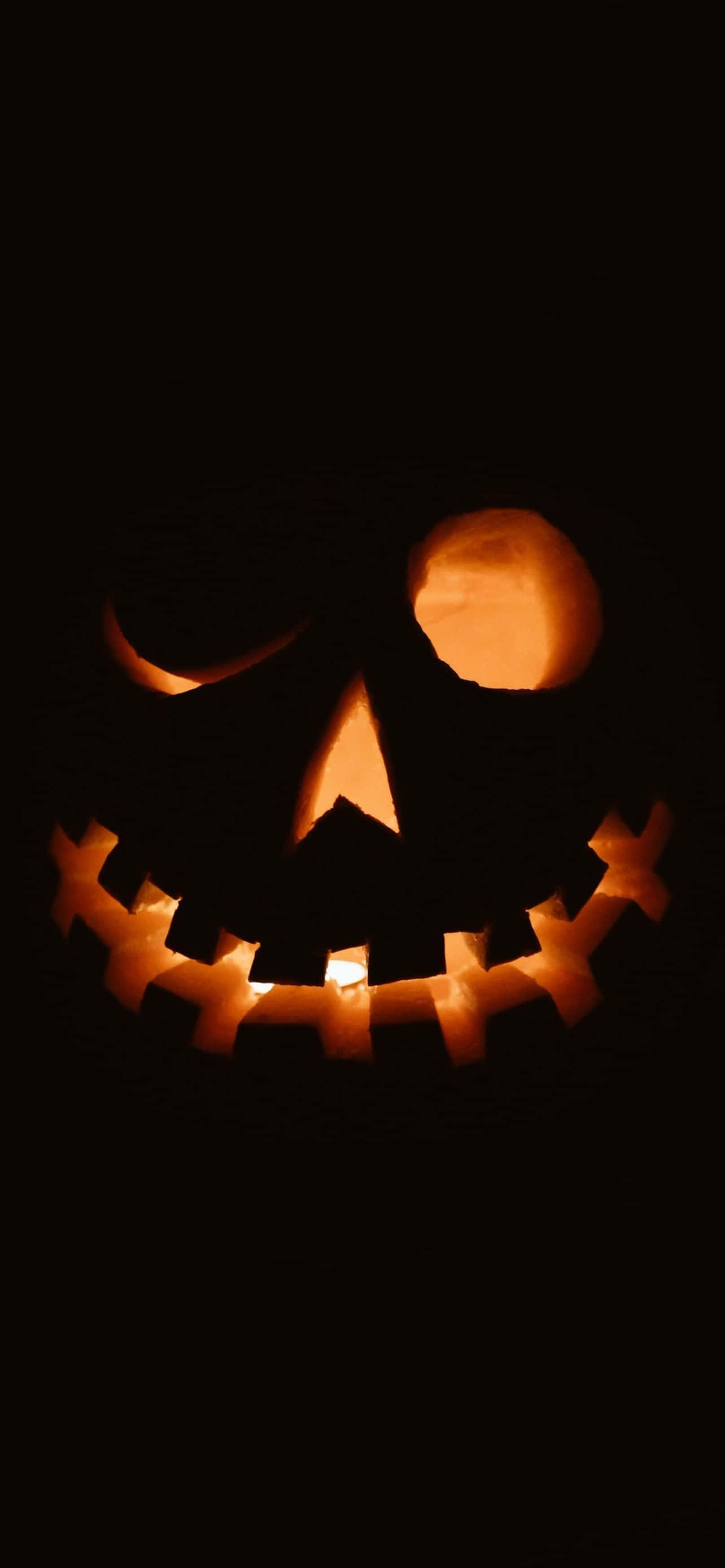 Juhli Halloweenia räätälöidyllä taustakuvalla iPhonessasi Taustakuvat
