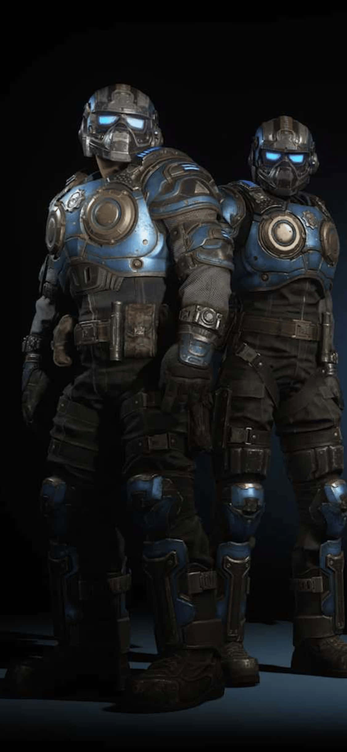 kaksi miestä sinisissä gears of war -asuissa seisomassa vierekkäin Taustakuvat