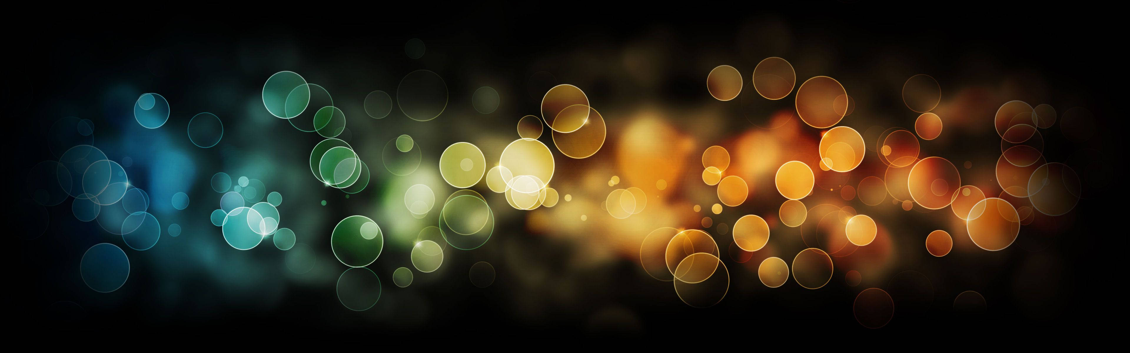 Kaksoisnäytön Bokeh-kuplat Taustakuvat