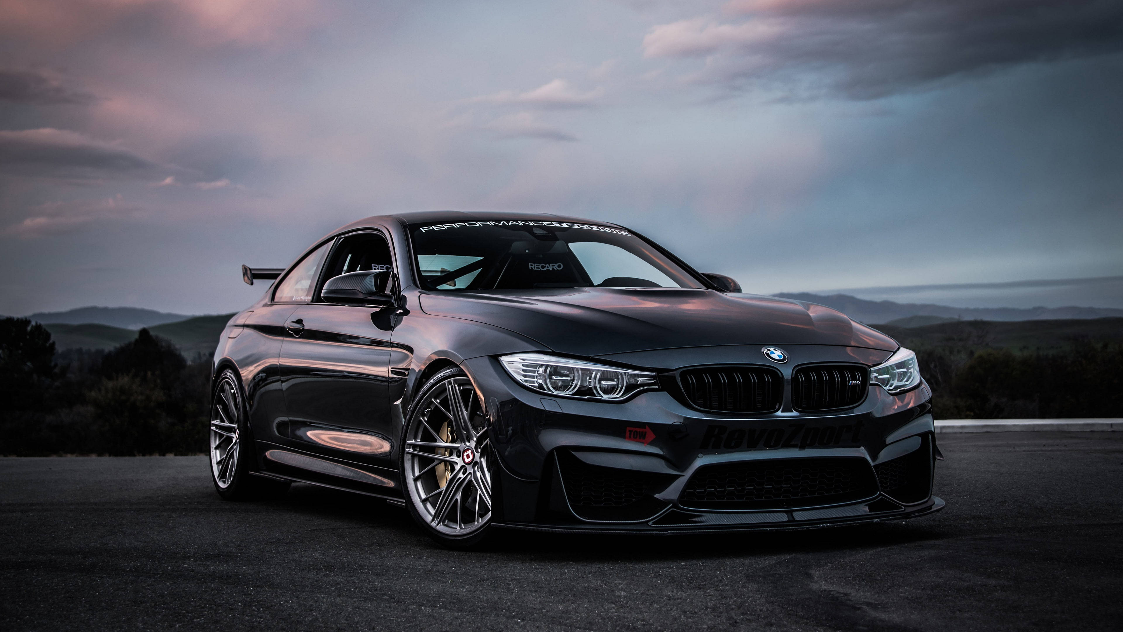 Kiiltävä musta BMW M4 -auto Taustakuvat