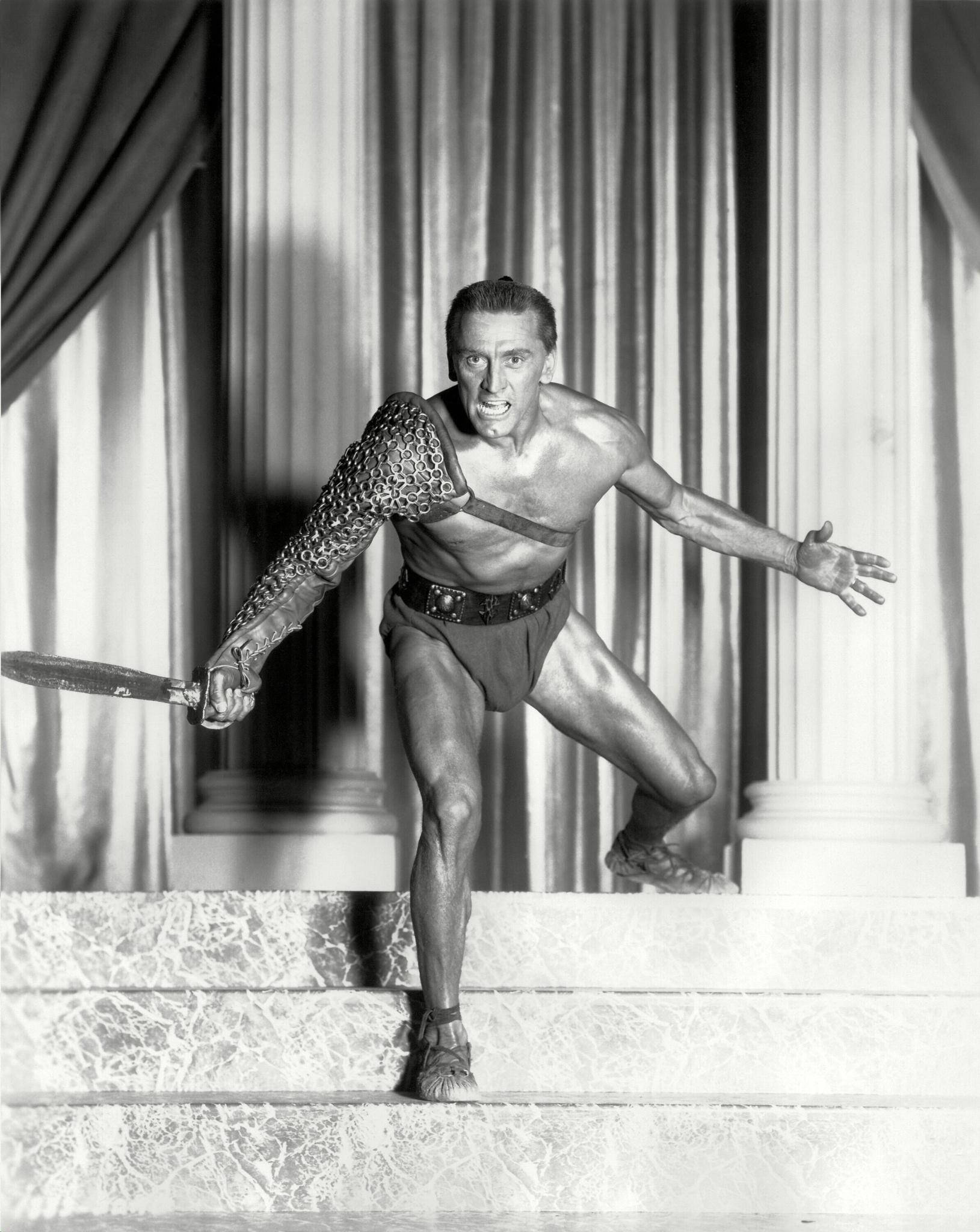 Kirk Douglas gladiaattoripuvussa Taustakuvat