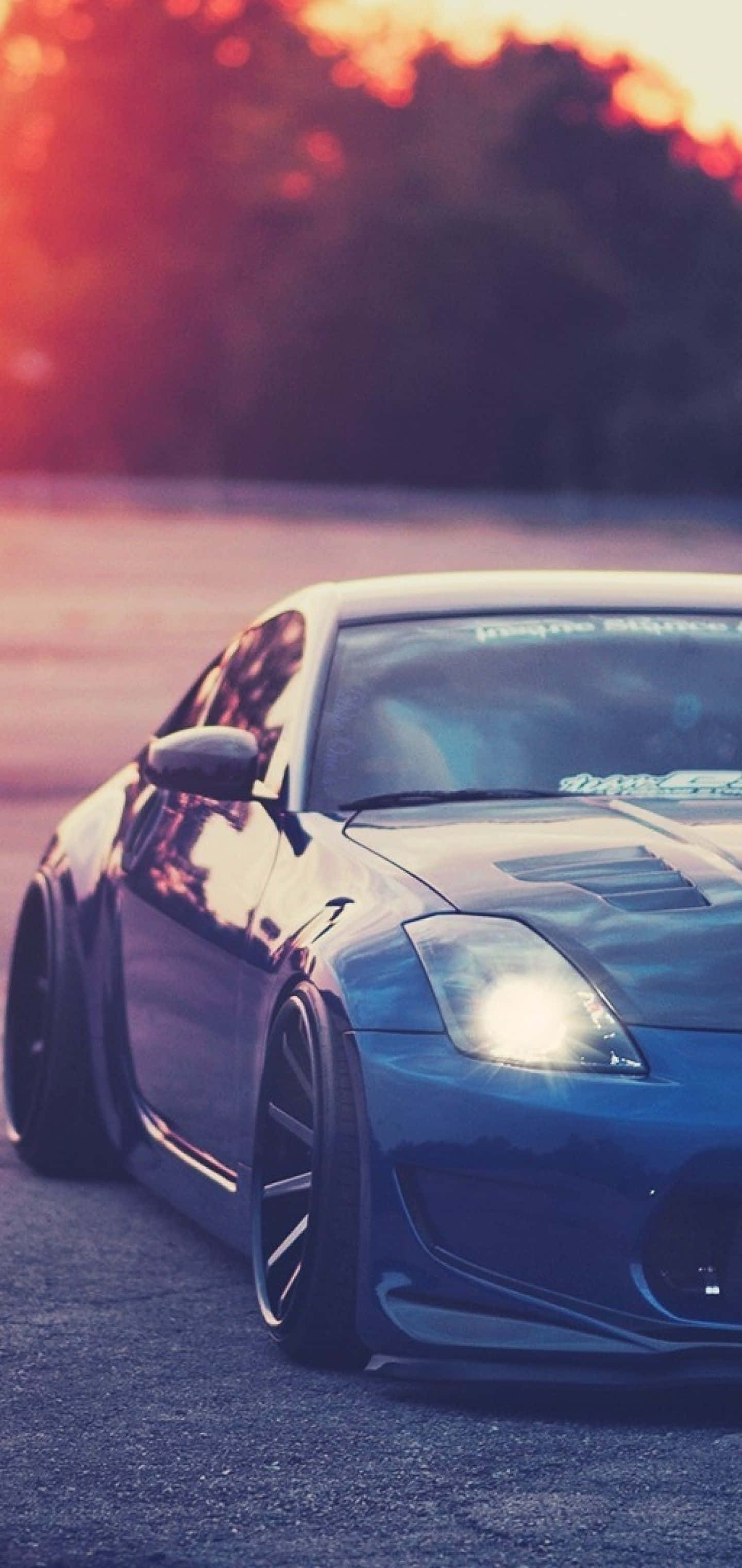 Metallinsininen Nissan 350Z iPhone Taustakuvat