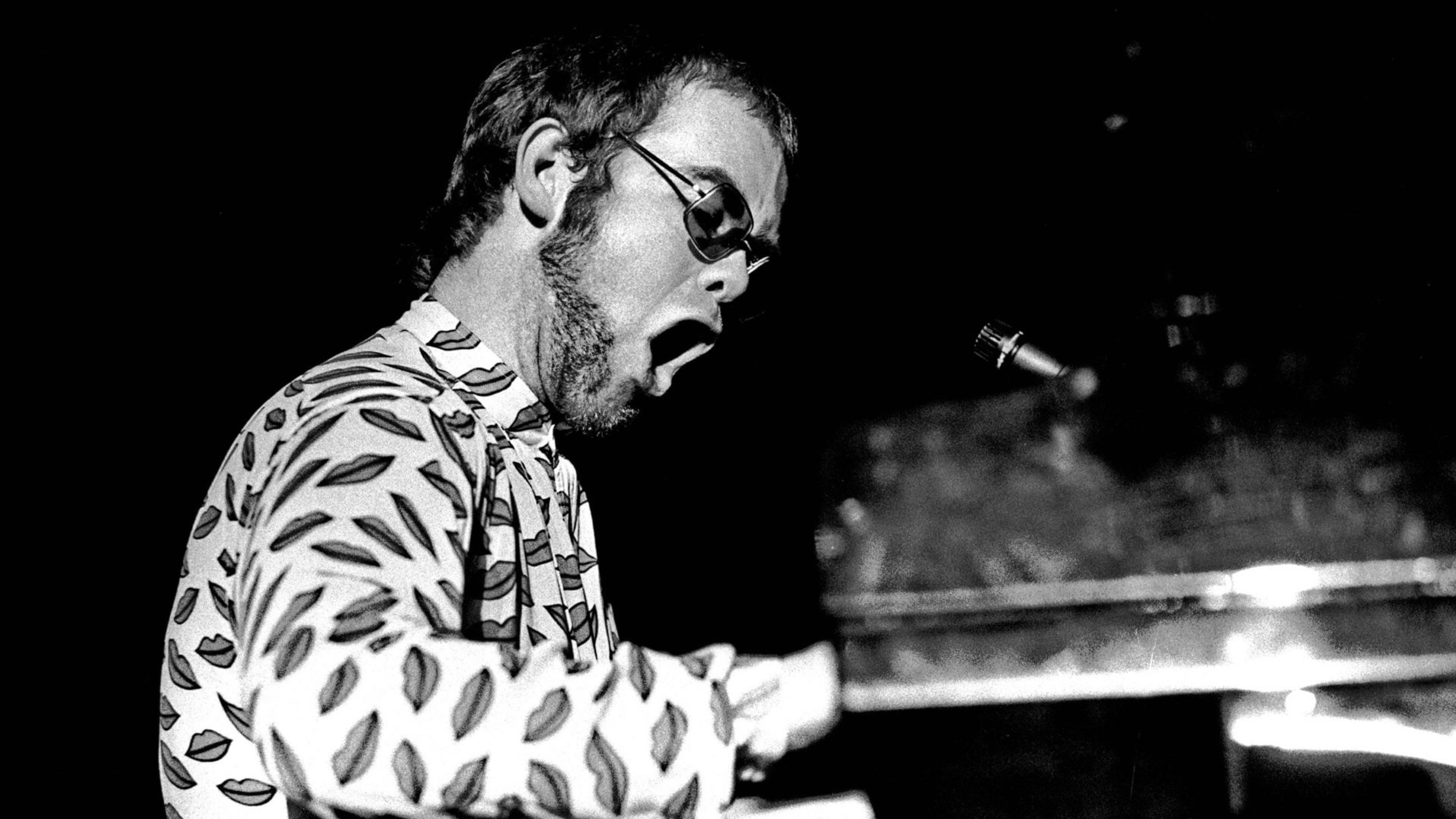 Mustavalkoinen klassinen Elton John -konsertti Taustakuvat