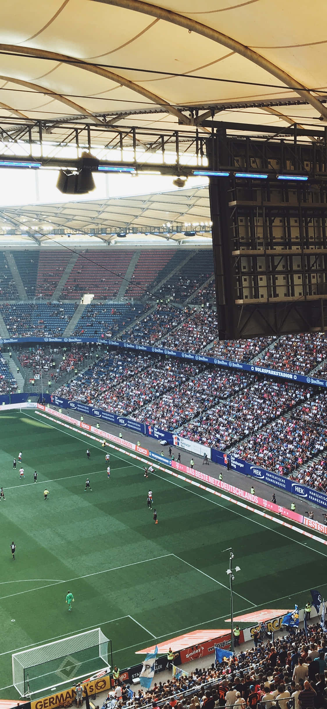 Nauti jalkapallostadionin sähköistävästä tunnelmasta Taustakuvat