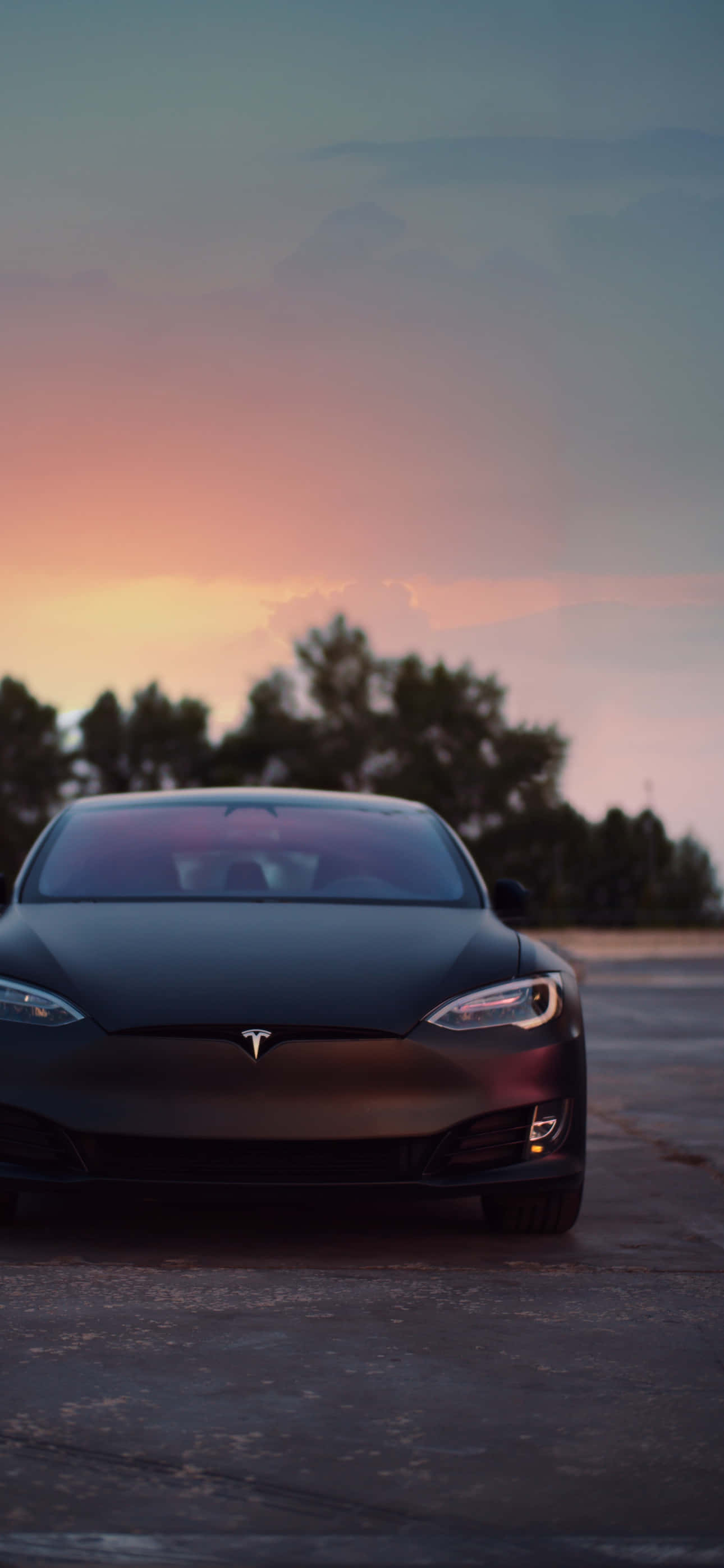 Nauti langattomasta maailmasta Tesla iPhonella Taustakuvat