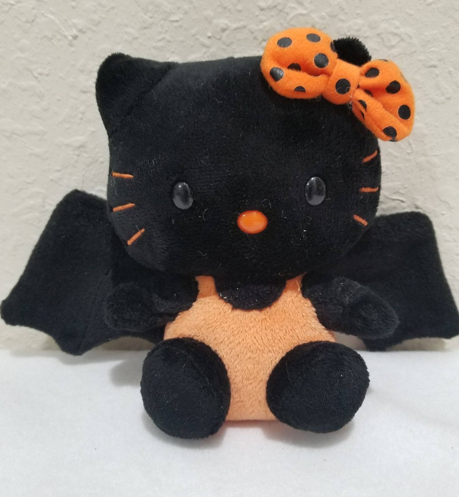 Oranssi-musta lepakko Hello Kitty Halloween Taustakuvat