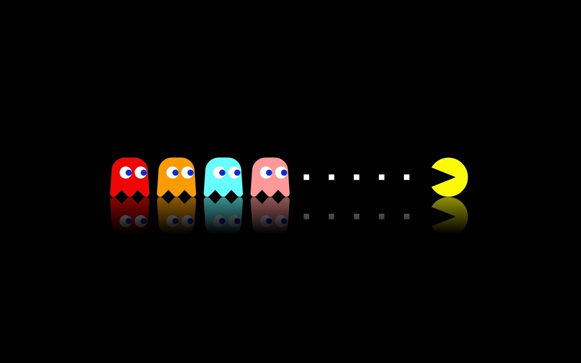 Pacman pelaamassa kohti haamuja -taustakuva