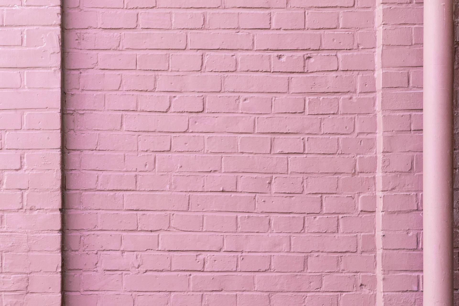 Pastellinpunainen tiiliseinä Taustakuvat