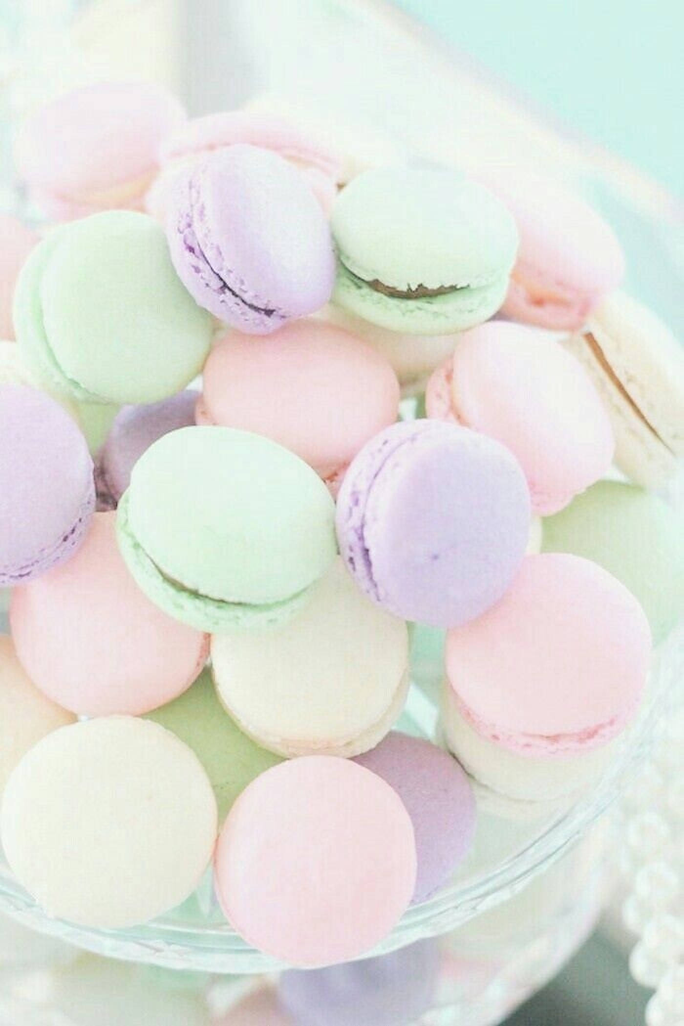 Pastellisateenkaaren ranskalaiset macaronit Taustakuvat