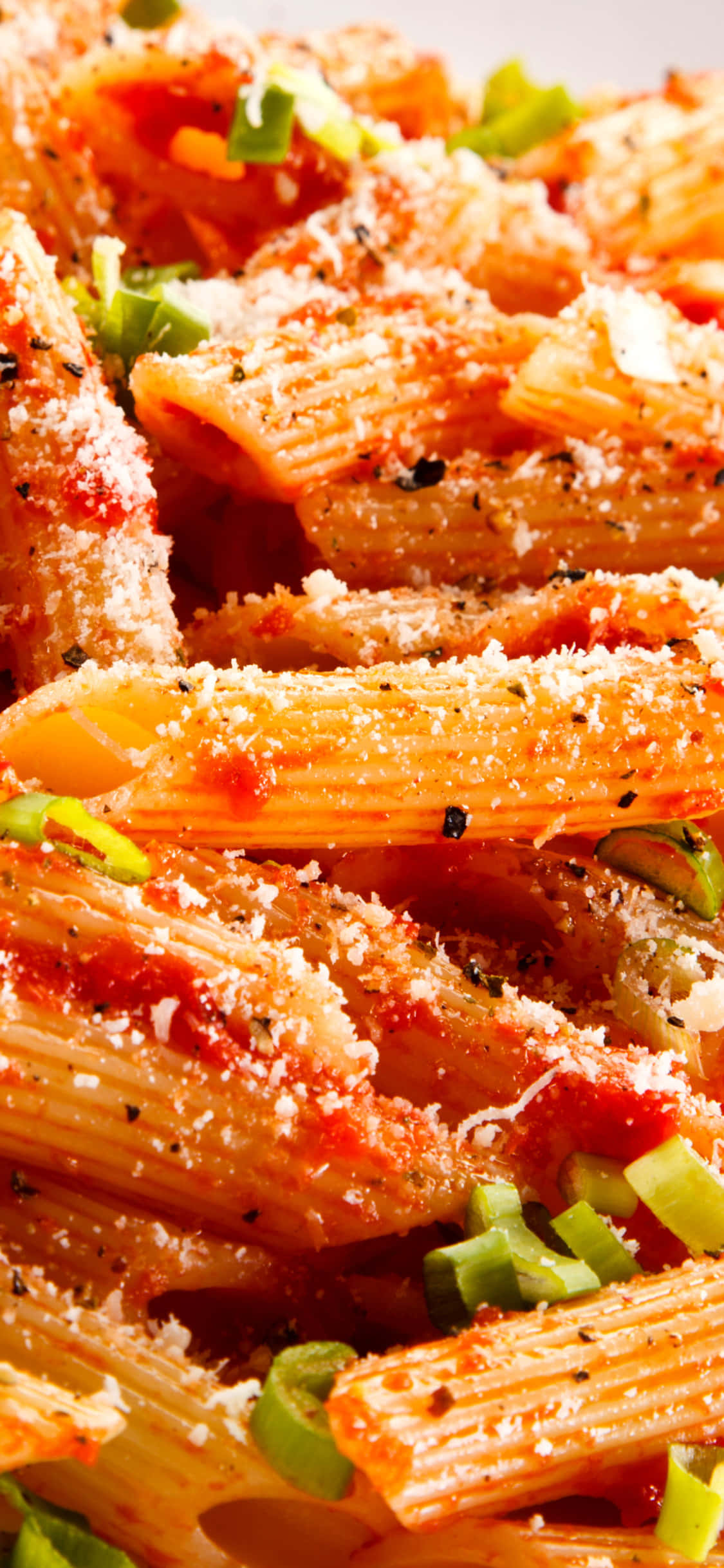 Penne-pastaa punaisella kastikkeella iPhone X -pastatausta Taustakuvat