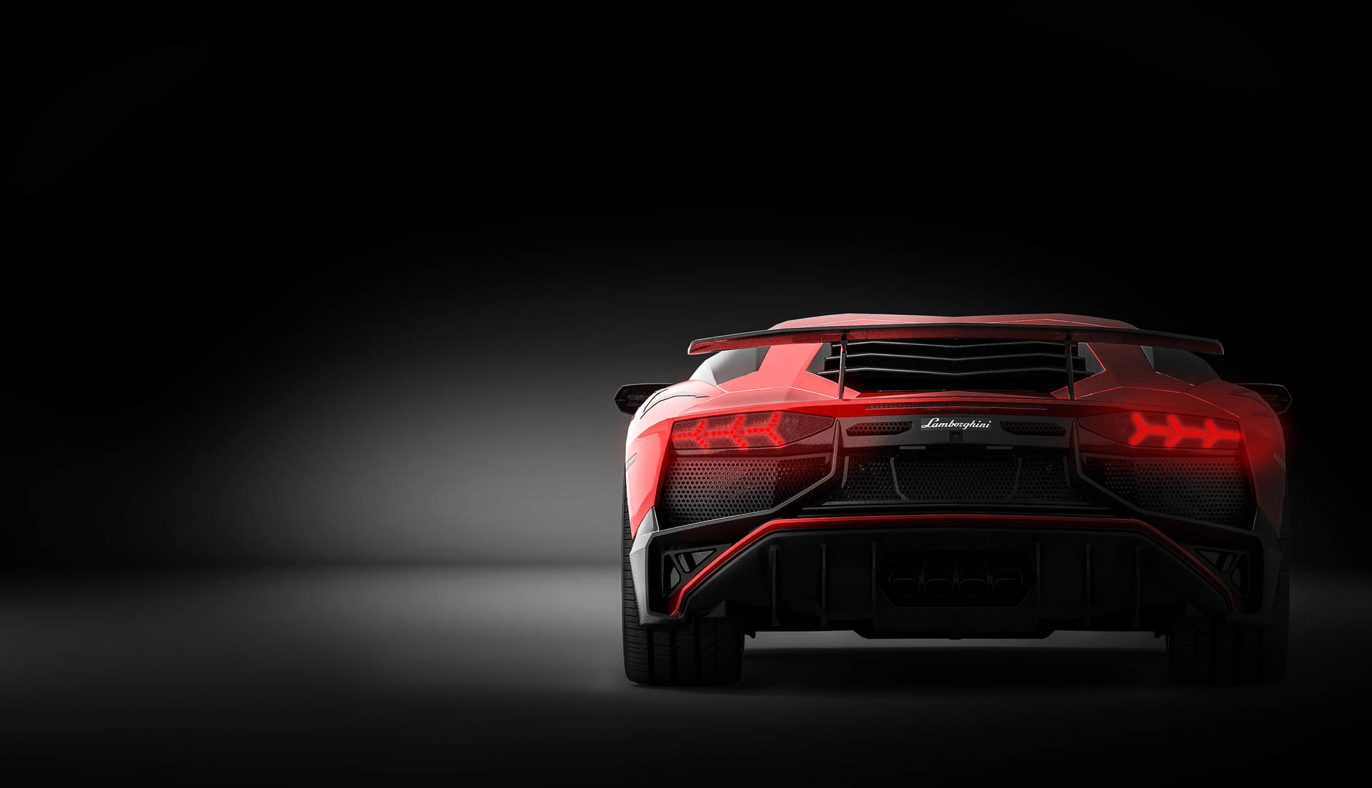 Punainen Lamborghini Aventador takaa -taustakuva.