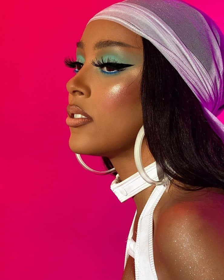 R&B-laulaja Doja Cat esiintymässä lavalla Taustakuvat