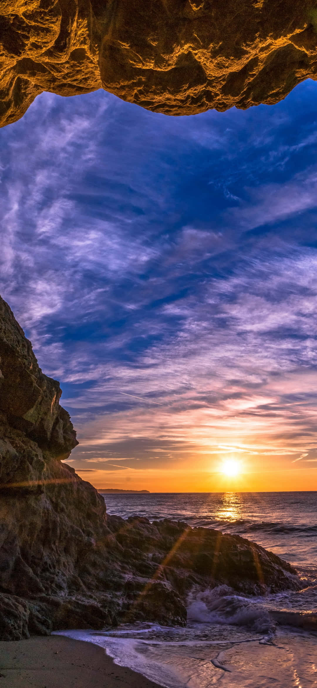 Rantaluola auringonlaskulla Android Malibu -taustakuva Taustakuvat