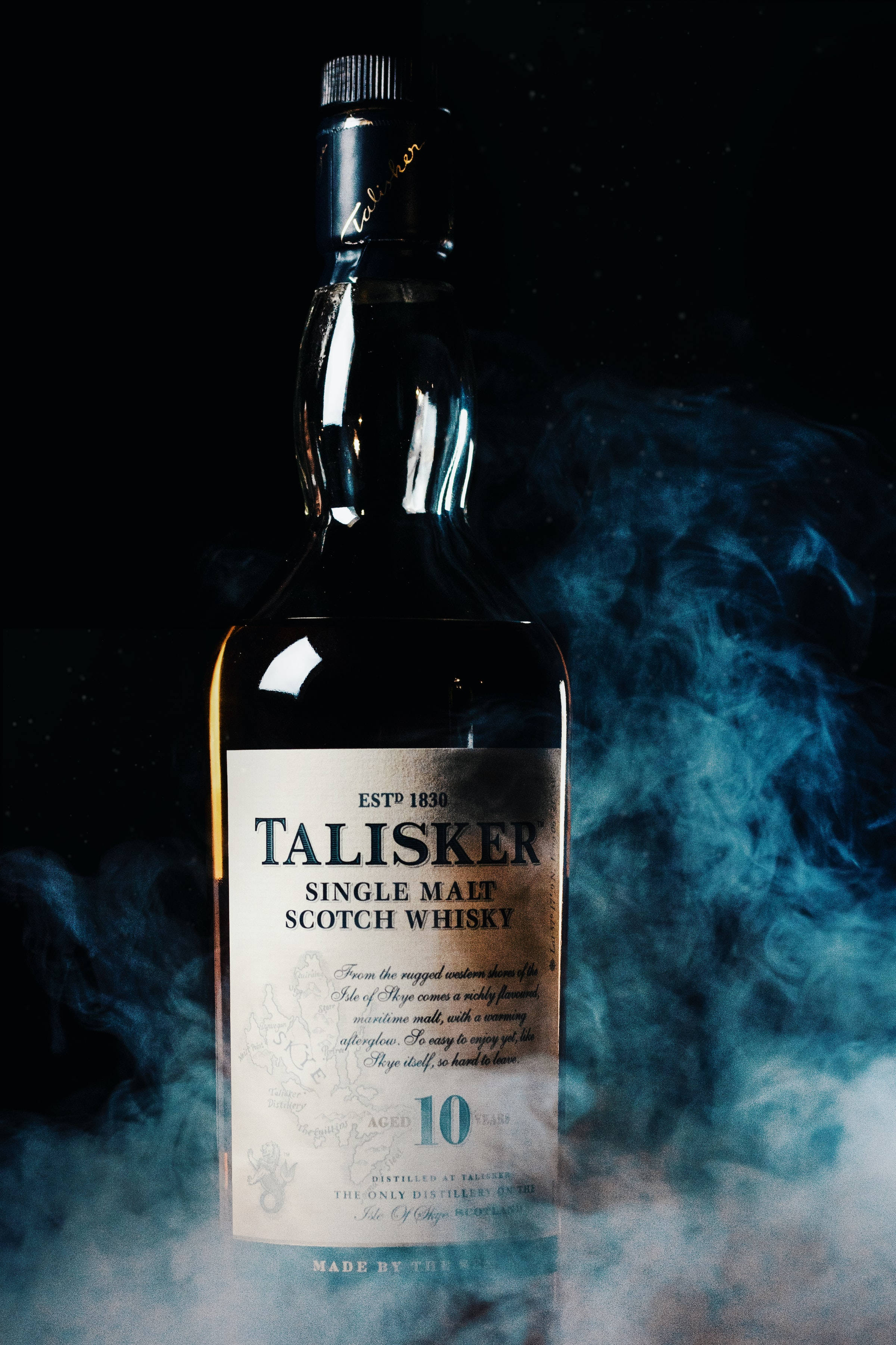 Savuinen Talisker-viskipullo Taustakuvat