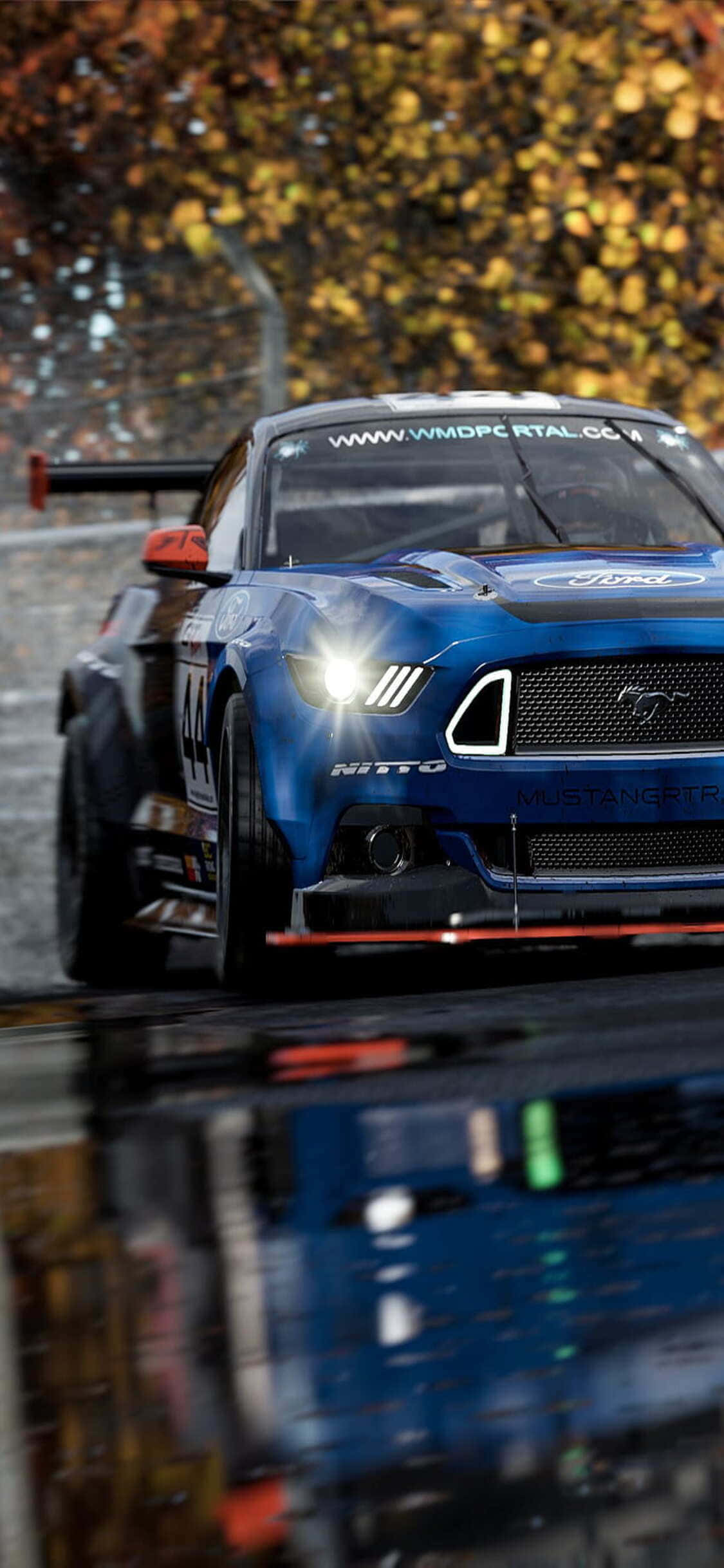 sininen mustang-kilpa-auto sateessa Taustakuvat