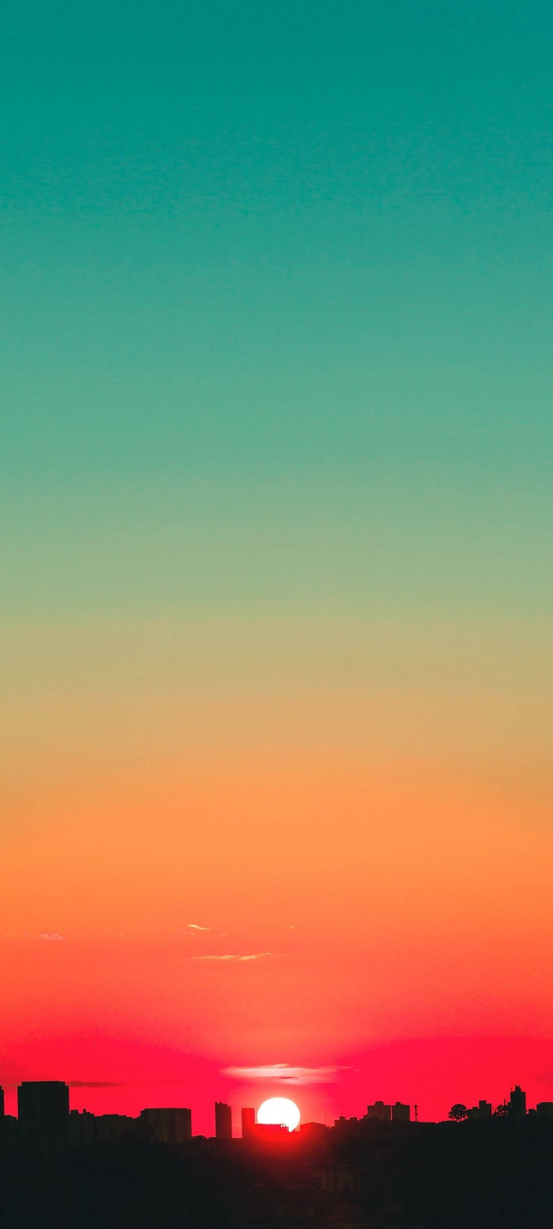 Teal Ja Punainen Auringonlasku Taivas Taustakuvat