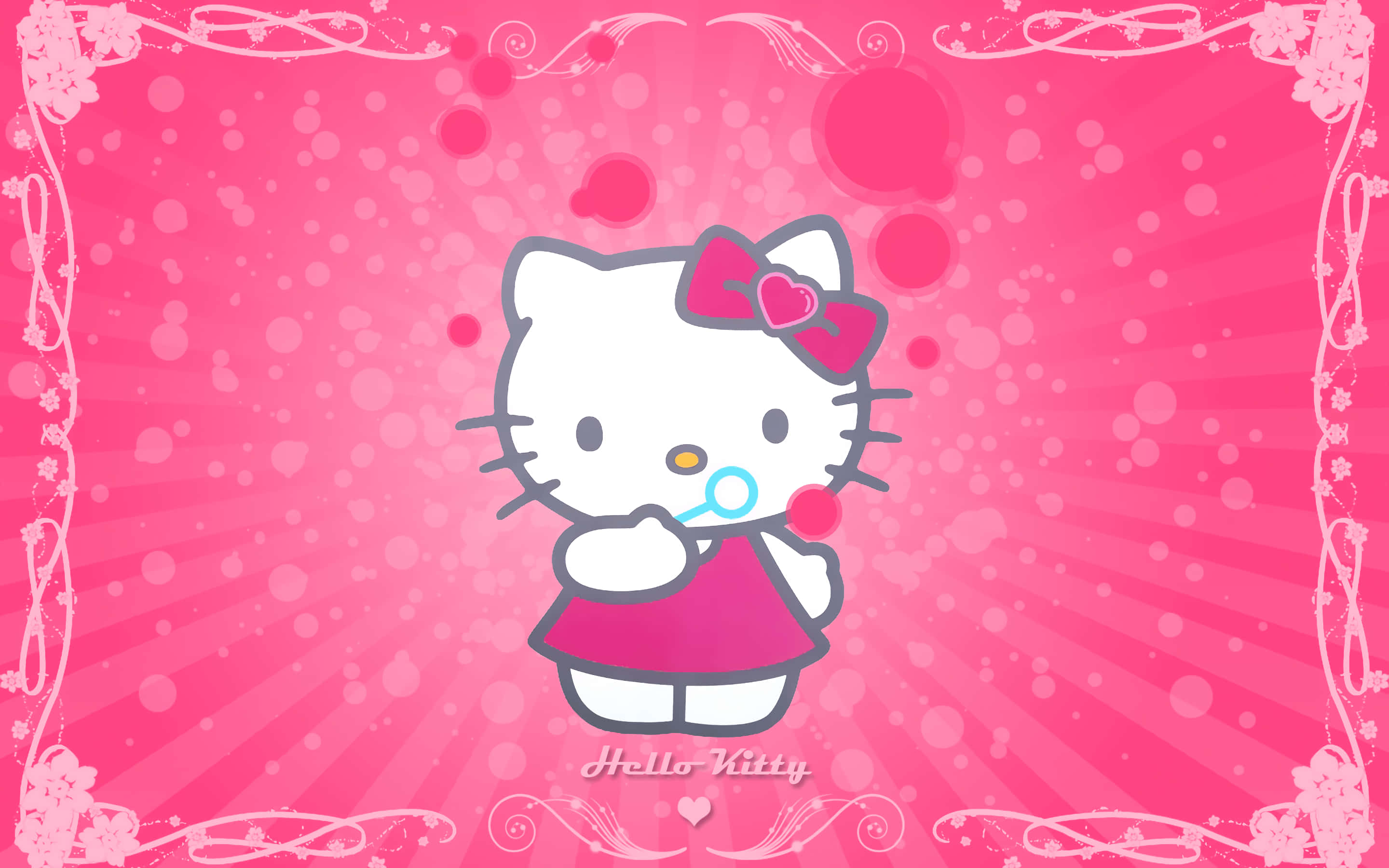 Söpö vaaleanpunainen Hello Kitty puhaltaa saippuakuplia Taustakuvat
