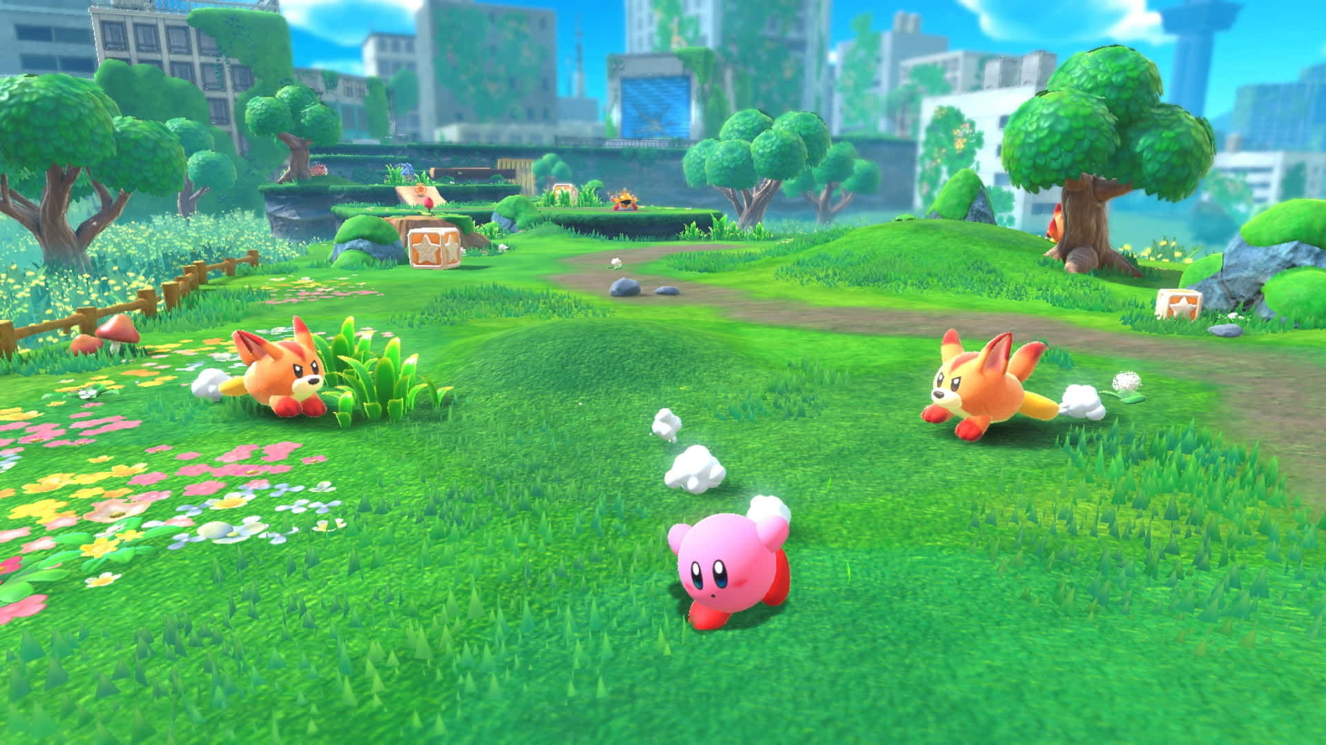 Suloinen Kirby-hahmo istuu värikkäiden tähtien kasalla Taustakuvat