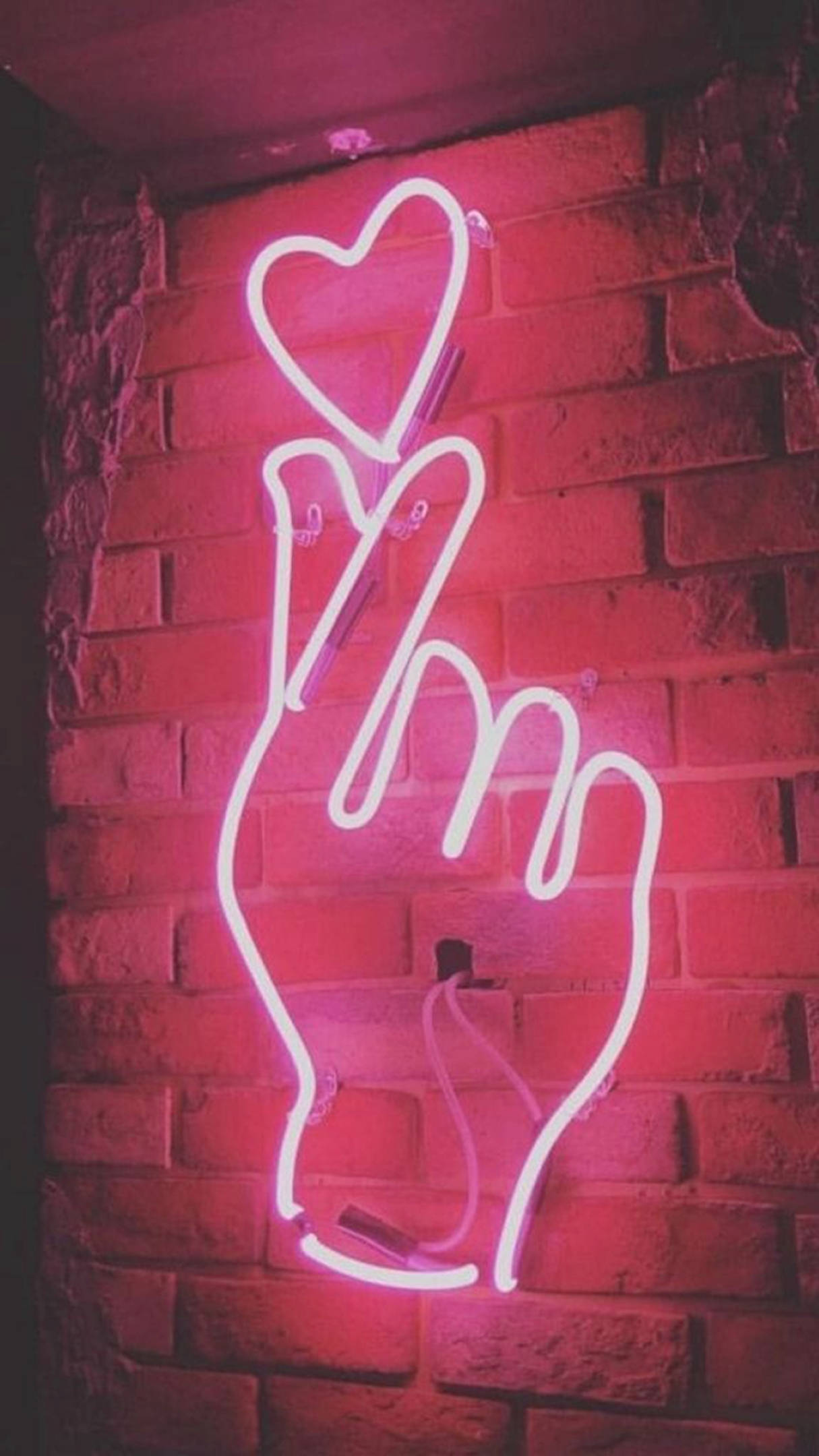 Sydänsormi neon tiiliseinä Taustakuvat
