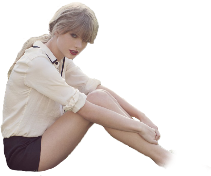 Taylor Swift istuu leikatussa kuvassa Taustakuvat