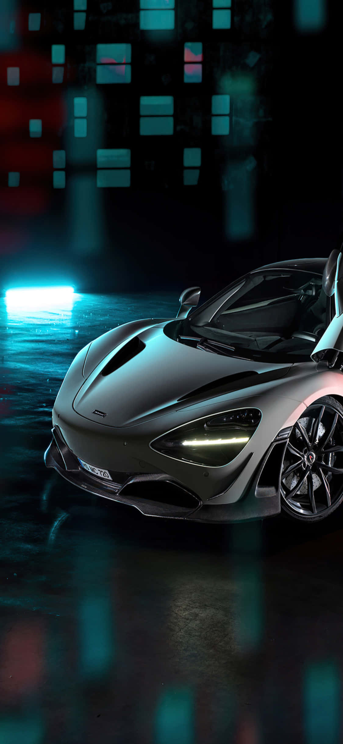 Tyylikäs iPhone X McLaren 720s -autotaustalla Taustakuvat