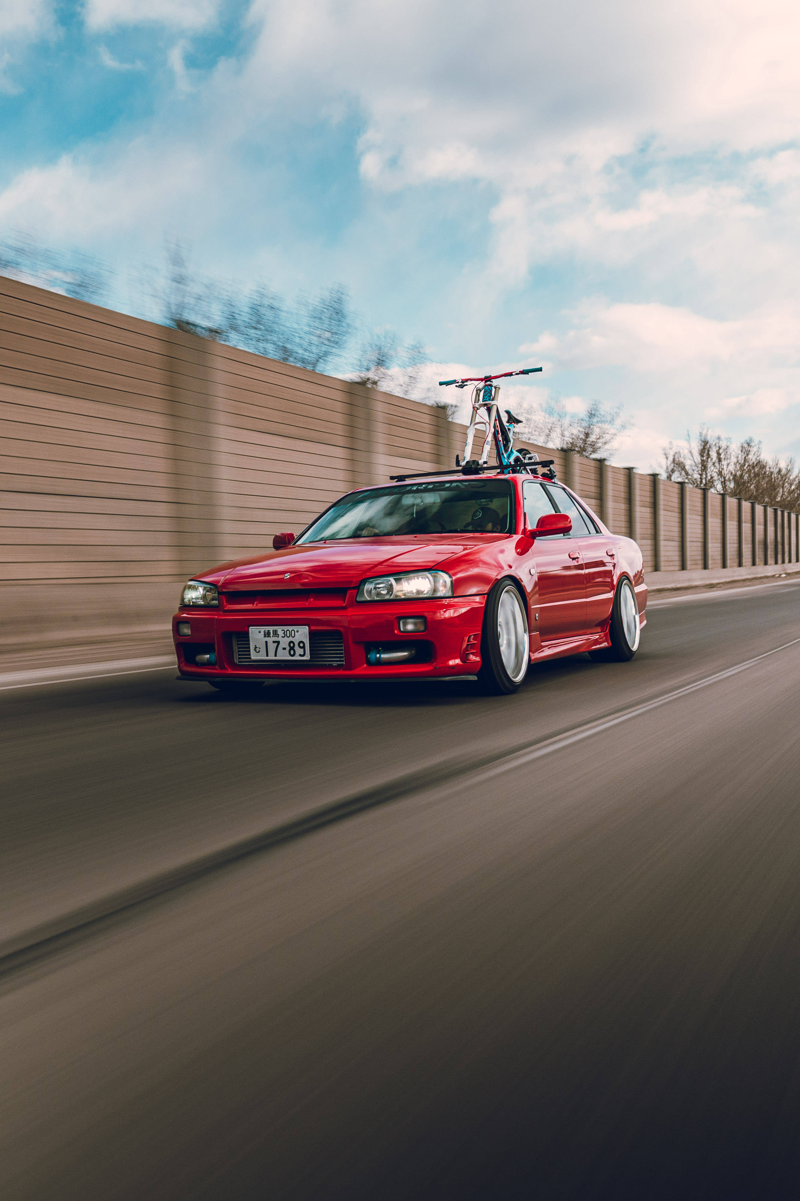 Tyylikäs punainen Nissan Skyline GTR R34 Taustakuvat