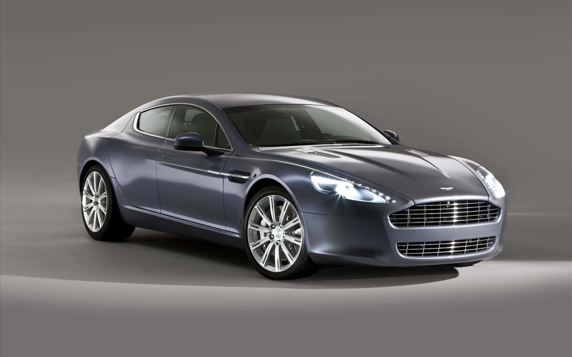 Upea Aston Martin Rapide S liikkeessä Taustakuvat