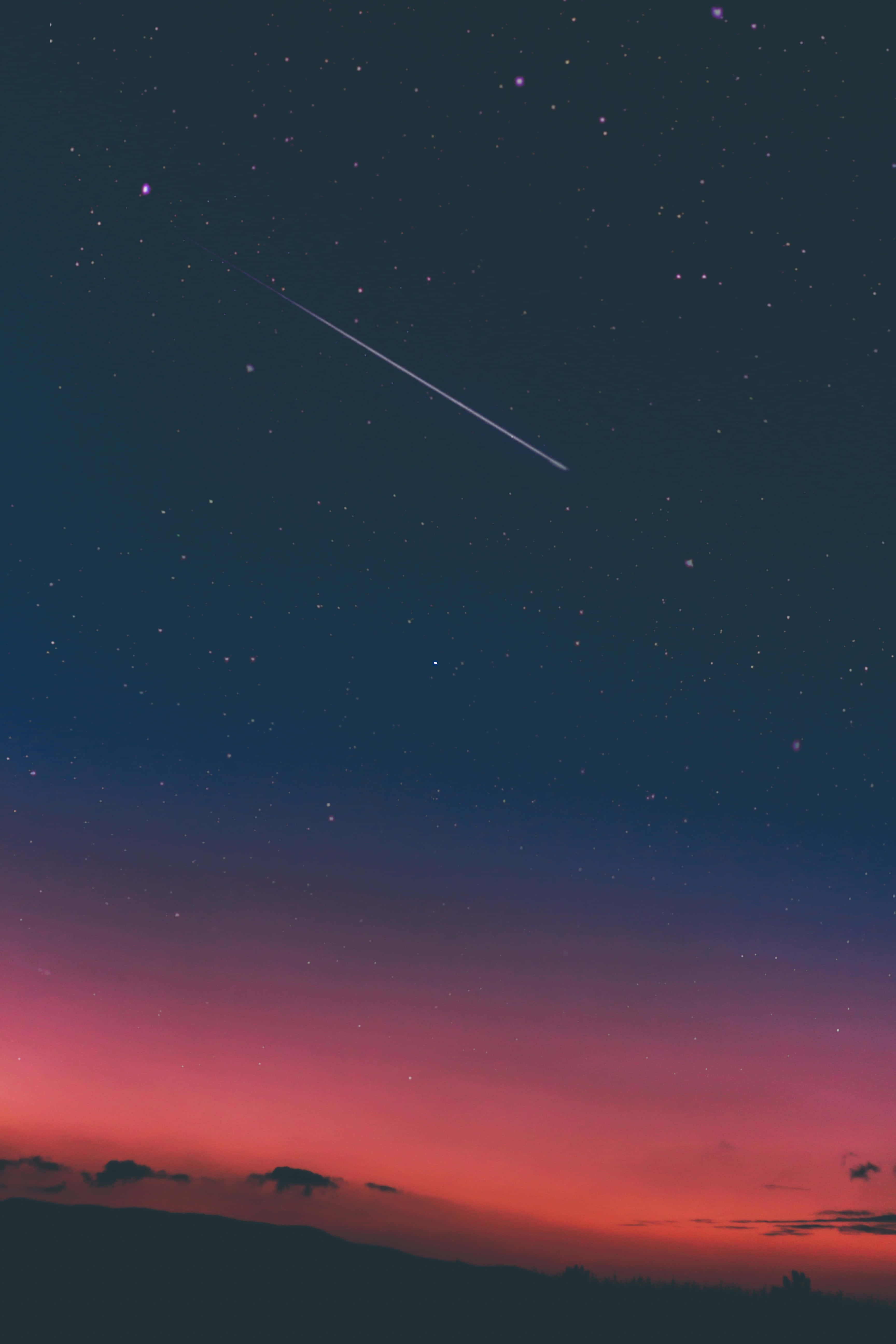 Upea vaaleanpunainen auringonlasku luonnossa iPhone-taustakuva Taustakuvat