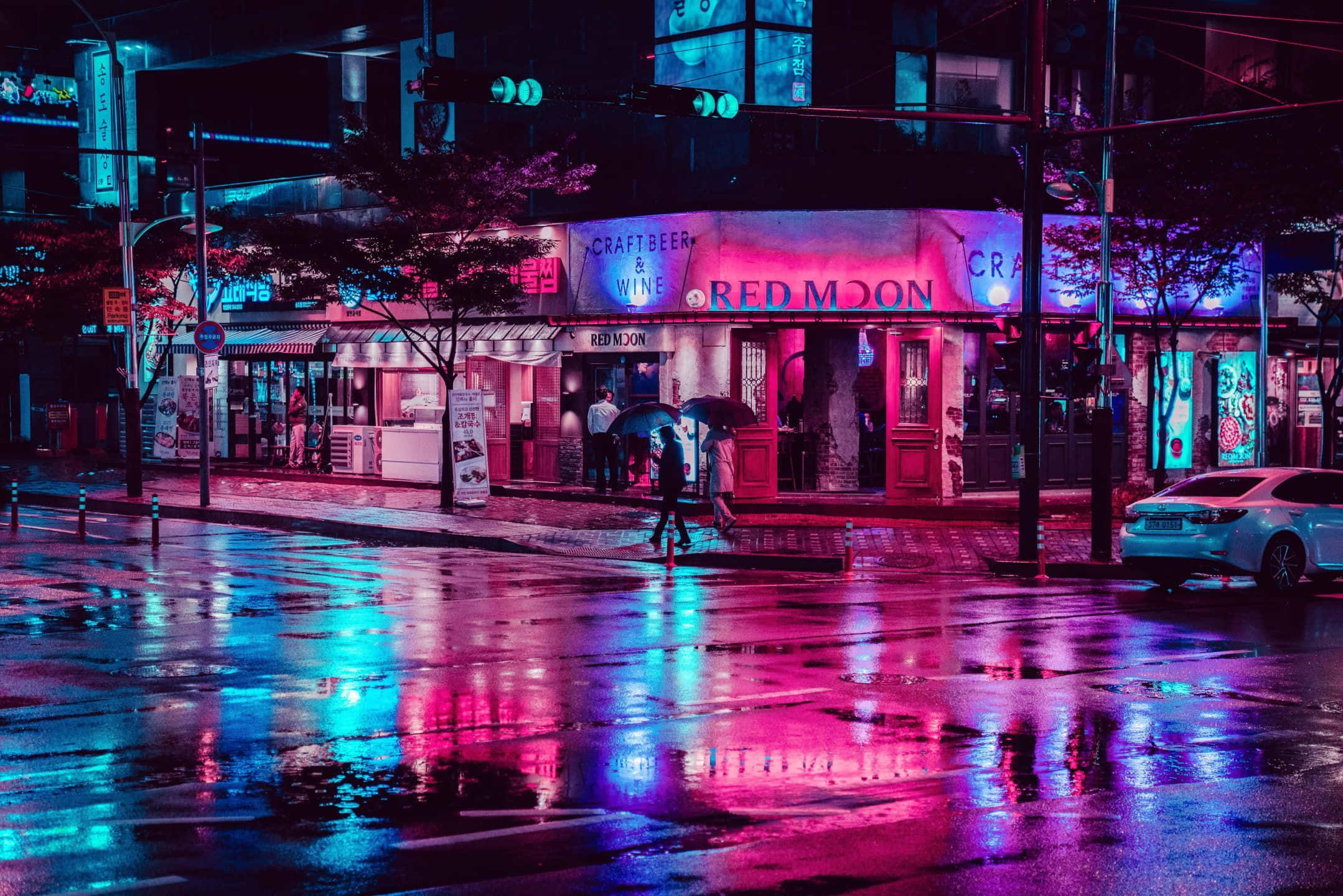Upoudu Neon Cityn elinvoimaisiin näkymiin. Taustakuvat