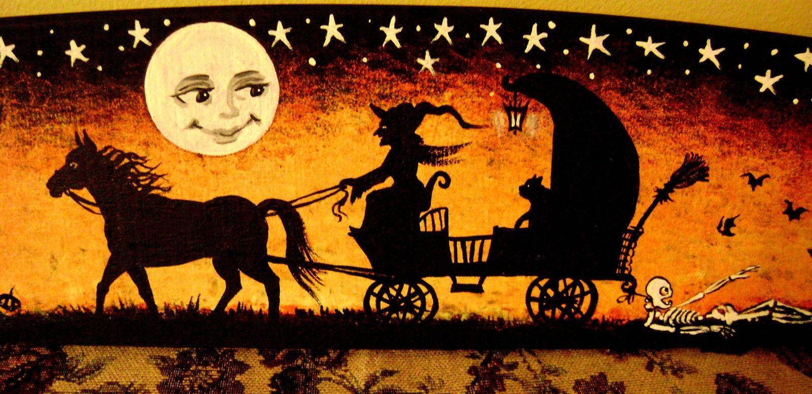 Vanhan ajan Halloween-noita vaunuissa Taustakuvat