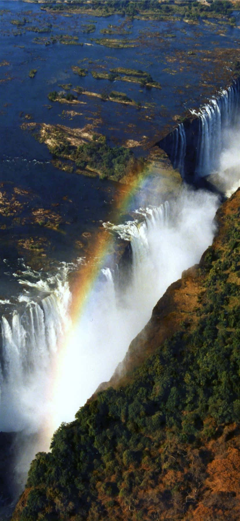 Victoria Falls sateenkaarella Taustakuvat
