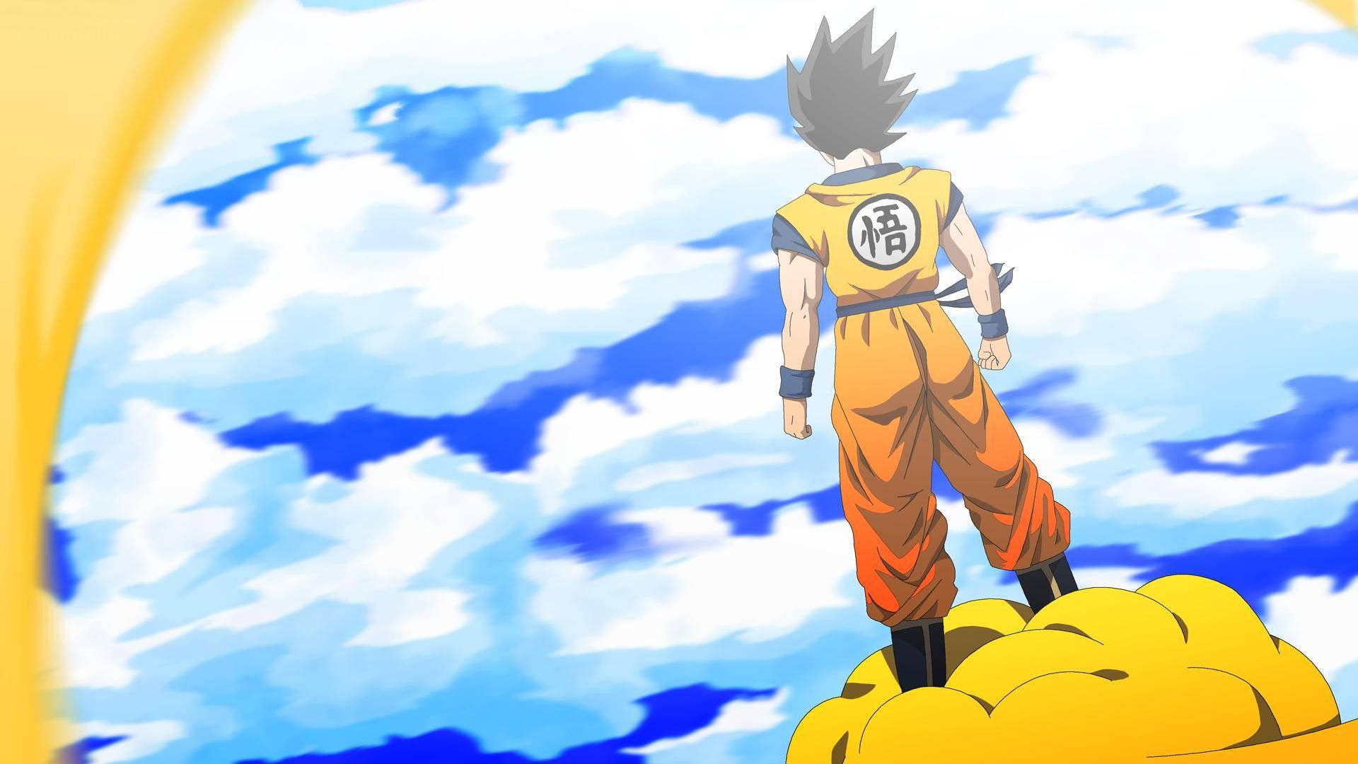Dragon Ball Z seisomassa keltaisella pilvellä katsomassa planeetta Namekia, suositun animen super saiyan -hahmo.