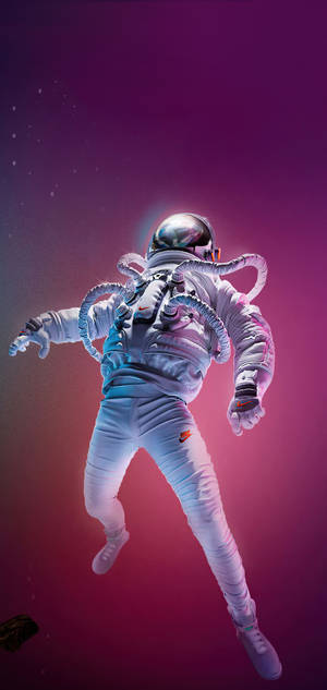 Astronautti sci fi ajelehtimassa neonavaruudessa -taustakuva — iPhone 16 Pro Taustakuvat